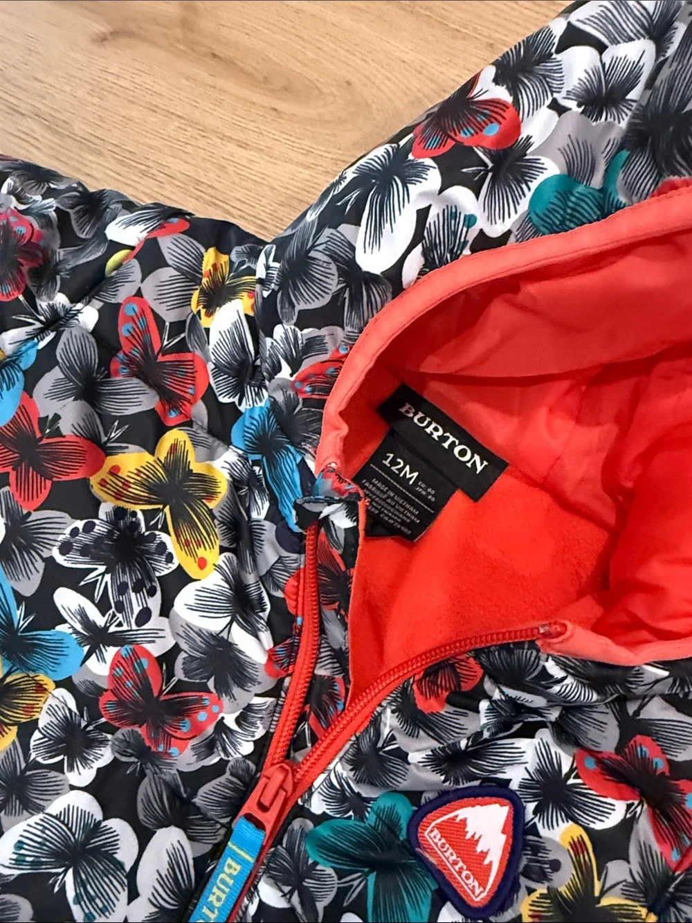 Burton Kids One-Piece Snowsuit with Multicolor Butterfly Pattern and Red Trim
